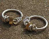 Handmade gold and silver hoop earrings