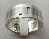 Steel and silver designer wedding ring