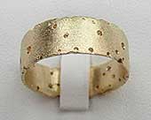 Unique handmade 9ct gold wedding ring