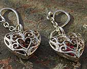 Unusual silver heart earrings
