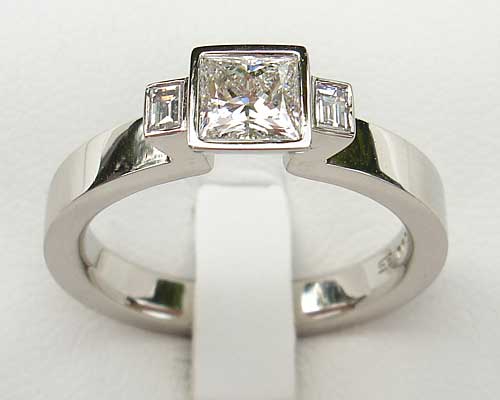 3 diamonds unusual engagement ring