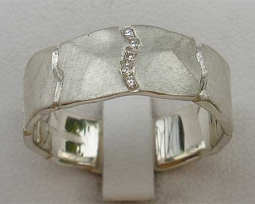 Channel set silver diamond wedding ring