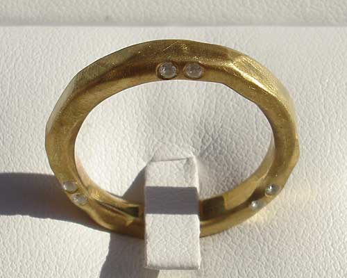 alternative gold eternity ring