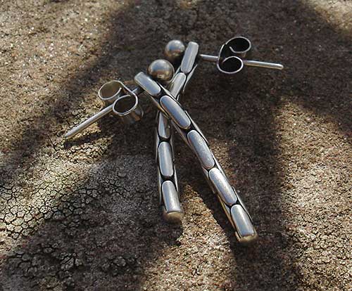 arty silver drop earrings