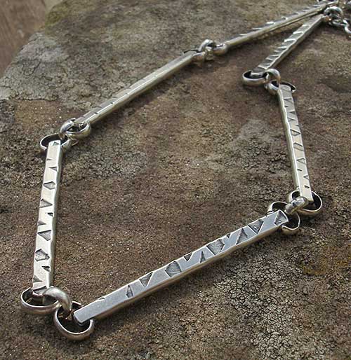 arty silver necklace