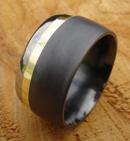 black gold and silver wedding ring