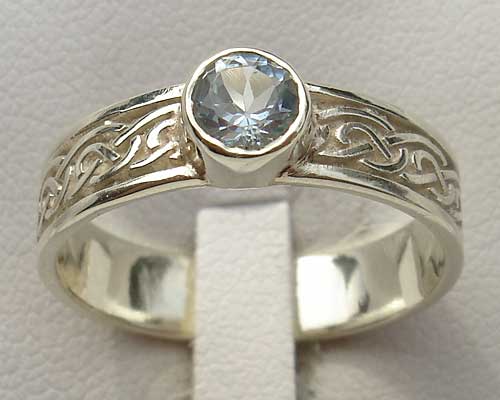 blue topaz celtic engagement ring