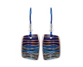 Contemporary titanium drop earrings featuring a striking rainbow inspired finish