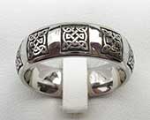 Celtic titanium ring engraved with a Celtic knot design