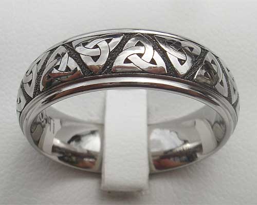 Titanium ring engraved with a Celtic trinity knot pattern
