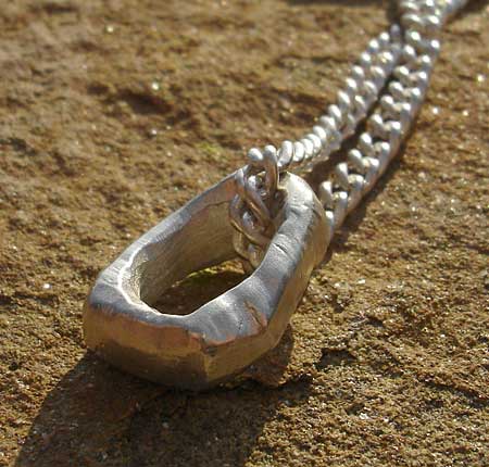 chain and hammered silver pendant