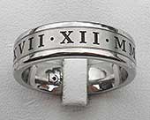 Combination finish Roman numeral ring