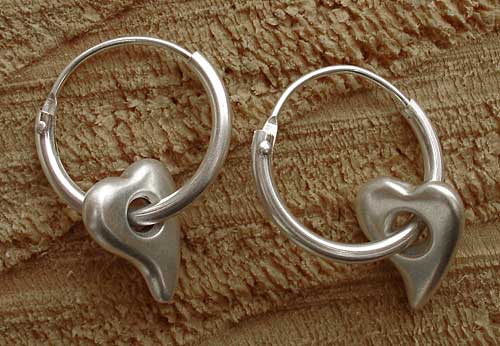Contemporary silver heart earrings