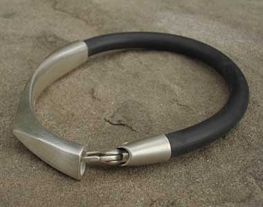 Designer black rubber and silver bracelet for men