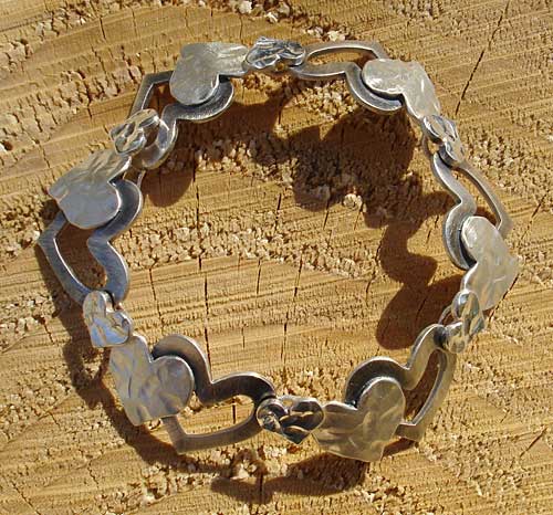 designer silver hearts bracelet