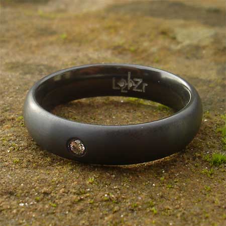 Diamond domed black wedding ring