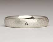 Beaten silver diamond wedding ring