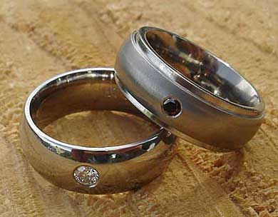 Domed diamond set wedding rings