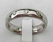 Domed 3 diamond wedding ring