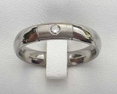 Domed two tone diamond set wedding ring