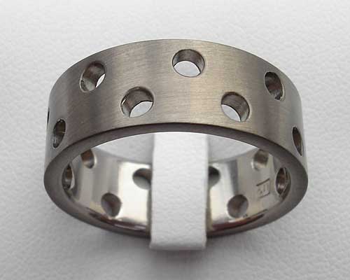 drilled holes titanium wedding ring