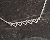 Five hearts symbolic love silver necklace