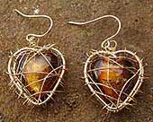 Gold caged heart drop earrings