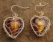 Gold caged heart earrings