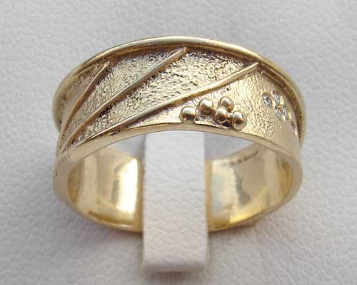 gold designer wedding ring
