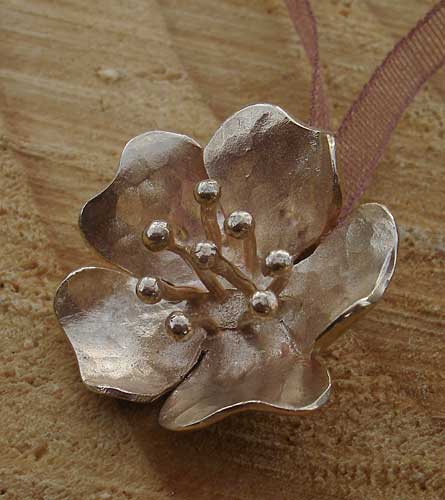 gold flower and ribbon necklace