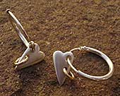 Gold and silver heart earrings