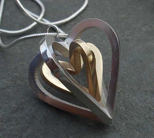 gold and sterling silver heart necklace