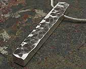 Hammered silver pendant and necklace