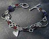 Handmade beaded silver heart bracelet
