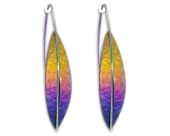 Titanium drop earrings featuring an elongated profile inspired by clean architectural lines