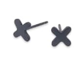Titanium stud earrings featuring a clean modern kiss-shaped design
