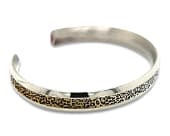 Titanium cuff bangle with a leopard print design