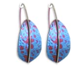 Striking titanium drop earrings inspired by traditional shield form