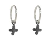 Titanium hoop earrings paired with a freely moving cross-shaped charm