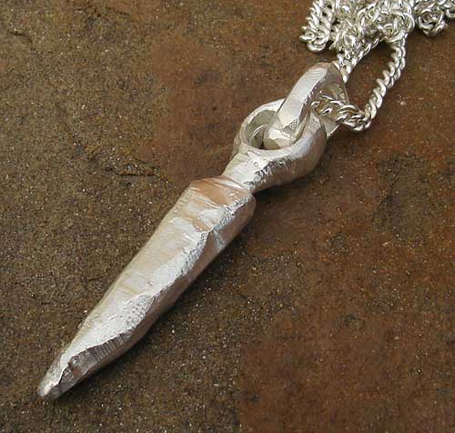pointy hammered pendant