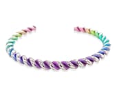 Rainbow titanium bracelet in a twisted-coil design inspired by classic rope detailing