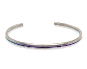 Slim titanium bracelet highlighted with rainbow colouring