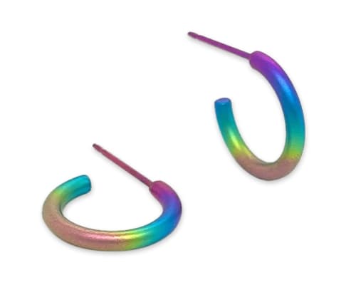 Classic rounded profile titanium hoop earrings with a rainbow finish