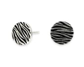 Round titanium stud earrings featuring a striking natural print design