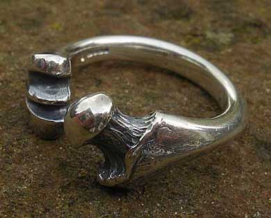 Silver bone shaped ring