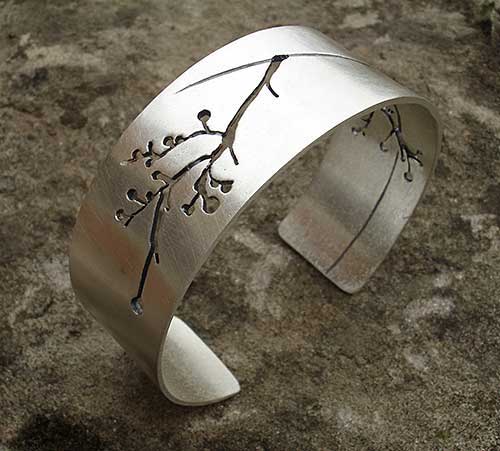 silver designer bracelet for women