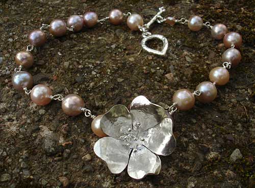 silver flower and pearl bracelet