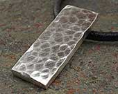 Hammered silver pendant