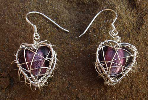 Silver heart cage earrings