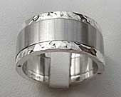 Silver and stainless steel wedding ring